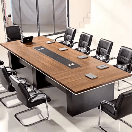 Make a powerful statement with a professional boardroom table, designed for high-level meetings, executive discussions, and collaborative brainstorming. Our collection features a wide range of styles and sizes, including 6-seater, 8-seater, 10-seater, 12-seater, and up to 20-seater boardroom tables to suit both small meeting rooms and large conference spaces. Choose from straight, oval, rectangular, racetrack, and boat-shaped table designs—crafted to elevate the look of your office. Available in quality finishes such as walnut, oak, beech, mahogany, maple, grey, white, and black, our tables are made from high-grade MDF, solid wood, metal frames, and scratch-resistant laminate for long-lasting durability. Perfect for corporate offices, NGOs, educational institutions, co-working spaces, and government agencies, our conference tables blend functionality with modern aesthetics. Find models with built-in cable management ports, wire boxes, integrated power sockets, and data ports for seamless presentations and connectivity. Explore modular conference table systems that allow flexible configurations for various room sizes and meeting formats. Our executive boardroom tables also pair well with ergonomic conference chairs, multimedia equipment, and presentation tools to complete the setup.