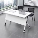 foldable conference table, mobile flip top training table, foldable boardroom table, movable folding conference table, flip top office meeting table, portable conference table with wheels, folding seminar table, collapsible boardroom table, modular foldable conference table, office training room table foldable, heavy duty flip top table, lockable wheel foldable meeting table, space saving conference table, folding office desk for meetings, mobile seminar boardroom table, modern foldable training table, multi purpose folding office table, wooden flip top conference table, steel frame foldable meeting table, nesting conference table